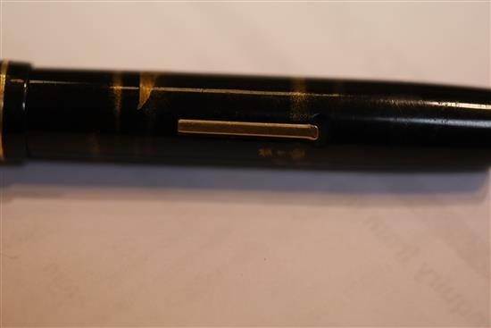 A Dunhill Namiki black lacquered fountain pen, 5.25in.